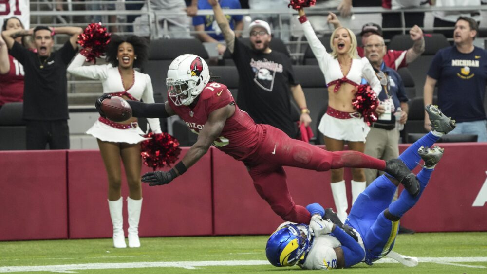Arizona Cardinals wide receiver Marvin Harrison Jr. stretches for a touchdown catch against the Los...
