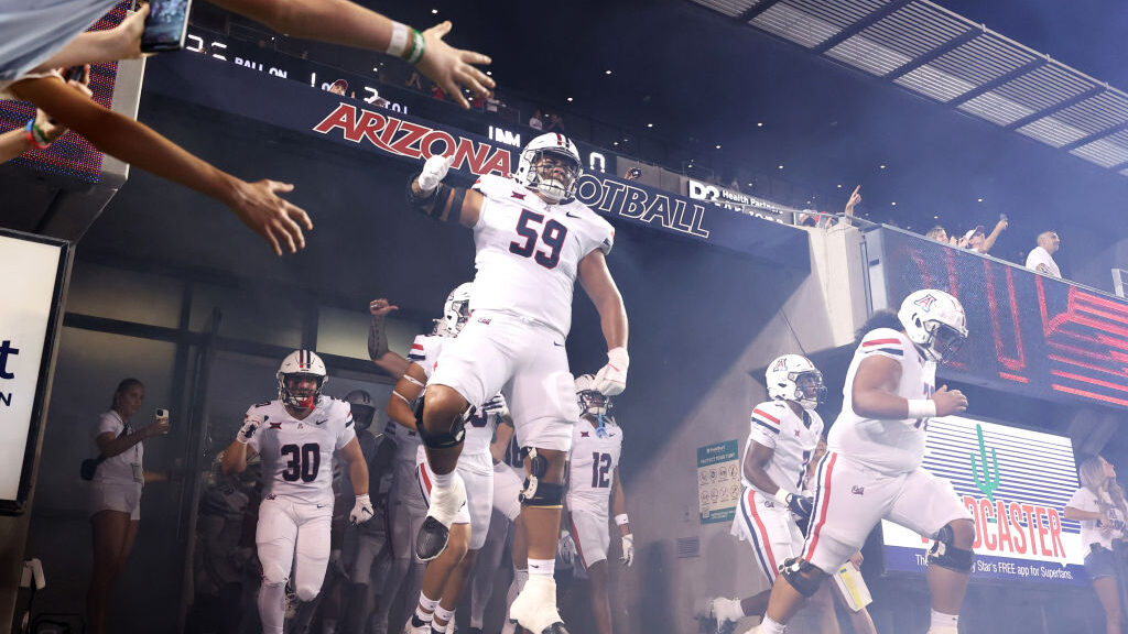 Offensive lineman Rhino Tapa'atoutai and the Arizona Wildcats remain ranked in the AP college footb...