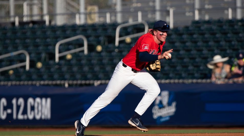 Arizona Wildcats Right-Handed Pitcher Tommy Splaine (20) waves off his pitcher to tag first during ...