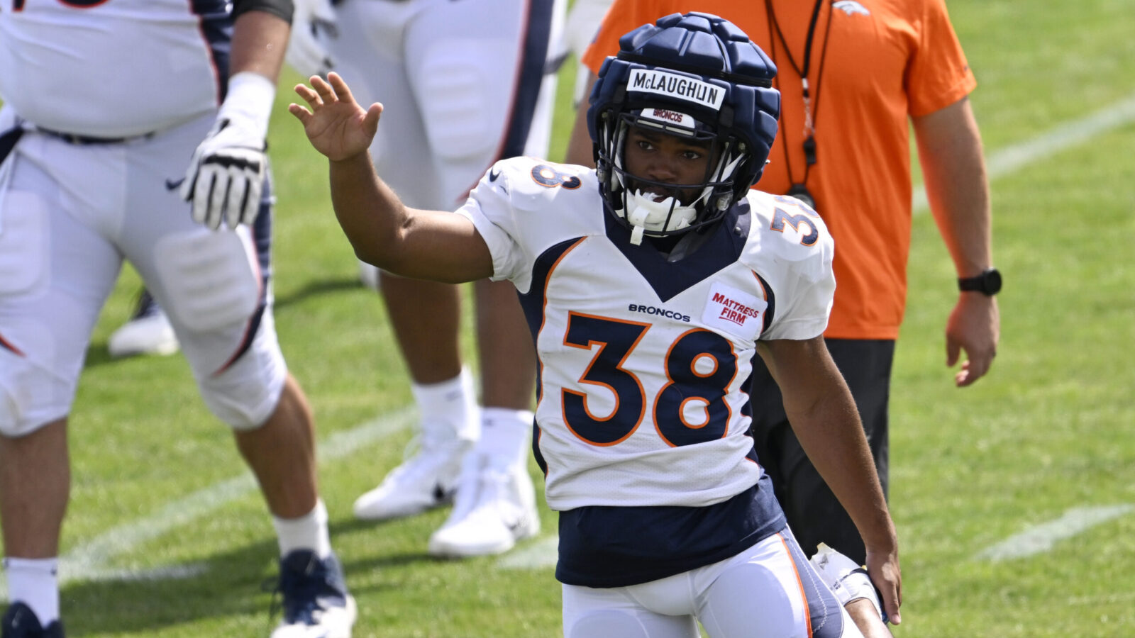 Denver Broncos running back Jaleel McLaughlin (38) works out during the Denver Broncos training cam...