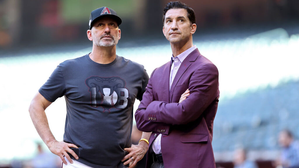 Manager Torey Lovullo (L) and general manager Mike Hazen of the Arizona Diamondbacks...