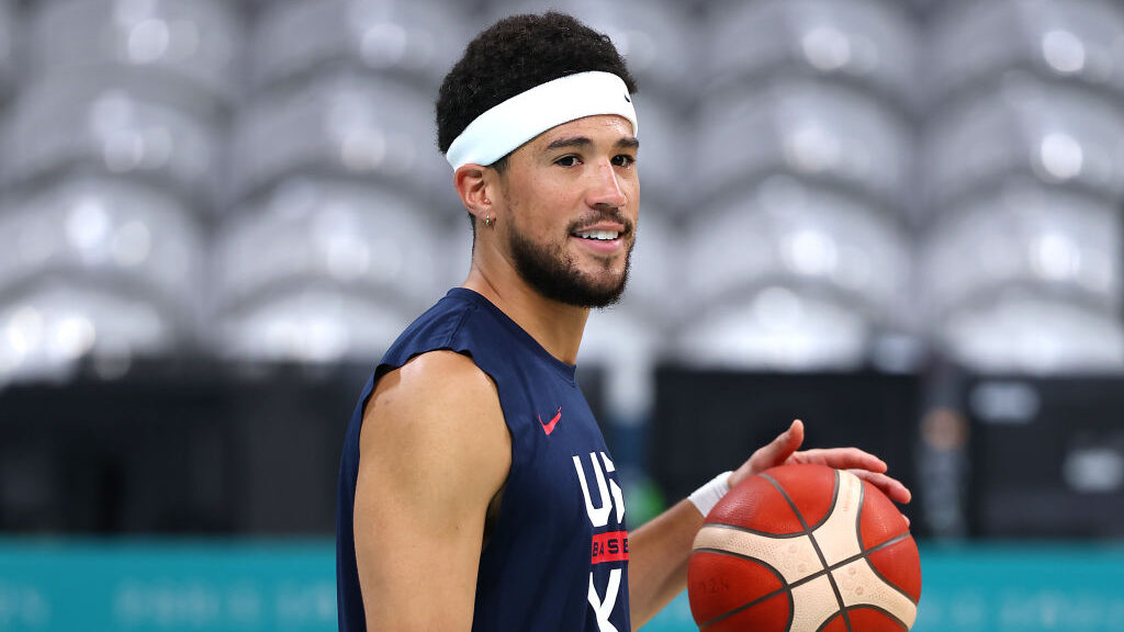 Devin Booker of Team United States looks on during the Basketball training session ahead of the Par...