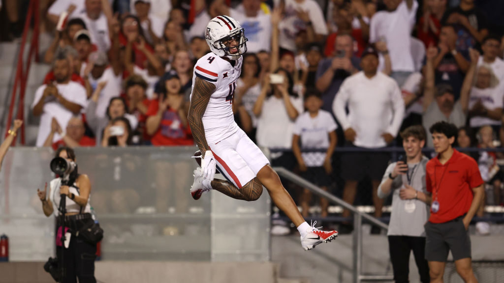 TUCSON, ARIZONA - AUGUST 31: Wide receiver Tetairoa McMillan #4 of the Arizona Wildcats celebrates ...