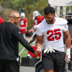 Arizona Cardinals pass rusher Zaven Collins and DC Nick Rallis work one-on-one during OTAs on Monday, May 20, 2024, in Tempe. (Tyler Drake/Arizona Sports)
