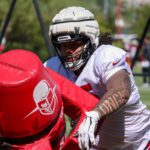 Arizona Cardinals DL Khyiris Tonga runs through drills during practice on Thursday, Sept. 19, 2024, in Tempe. (Tyler Drake/Arizona Sports)