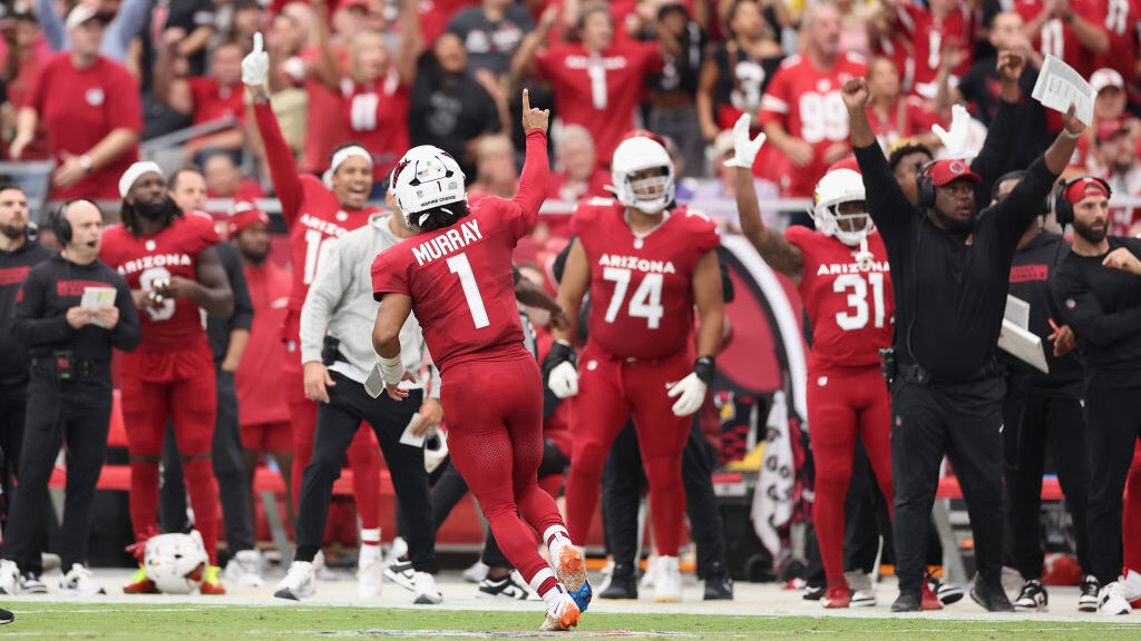 Quarterback Kyler Murray #1 of the Arizona Cardinals reacts after throwing a touchdown pass to Elij...