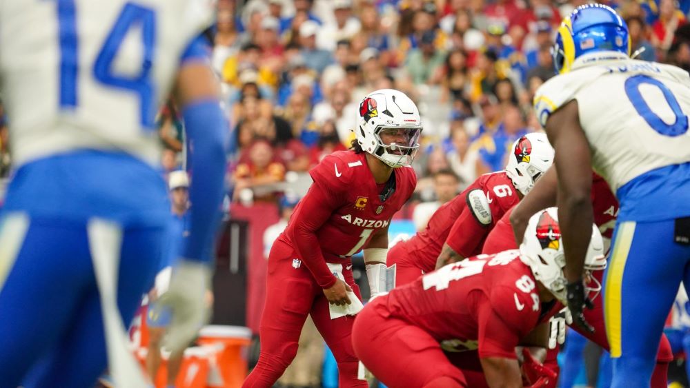 Arizona Cardinals quarterback Kyler Murray takes a snap against the Rams...