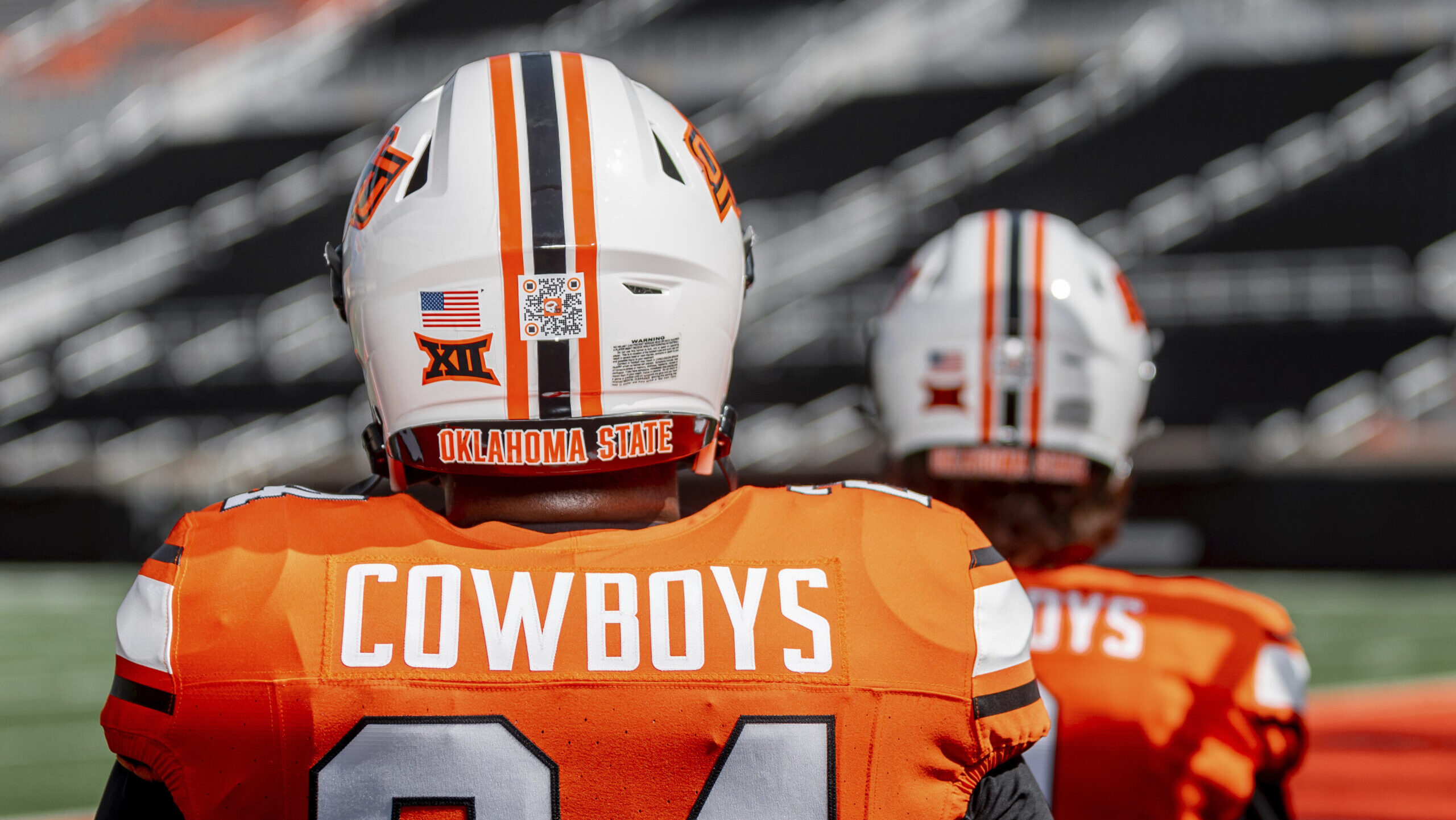 This photo provided by Oklahoma State Athletics shows a QR code on an Oklahoma State NCAA college f...