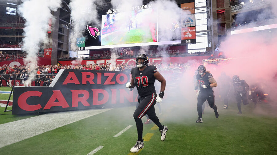 Arizona Cardinals OT Paris Johnson Jr. runs out of the tunnel...