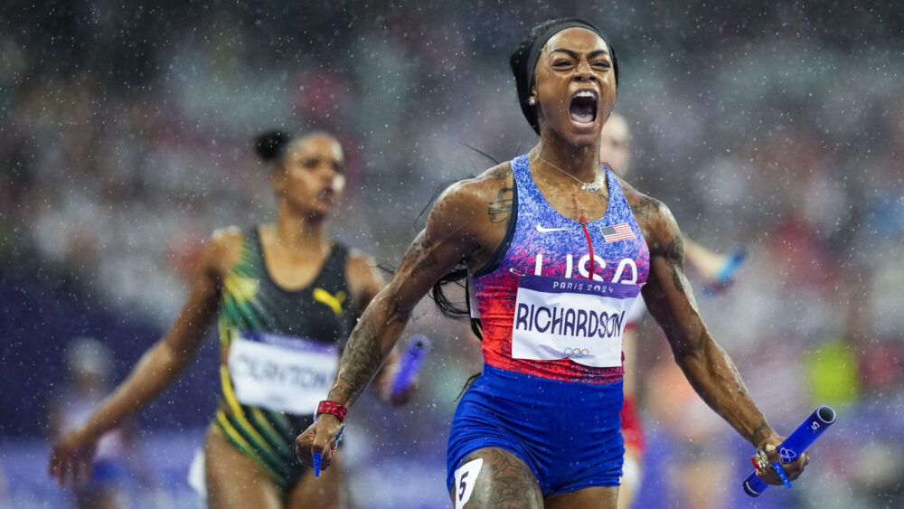 Sha'carri Richardson 0f the United States, celebrates after winning the women's 4 x 400-meter relay...