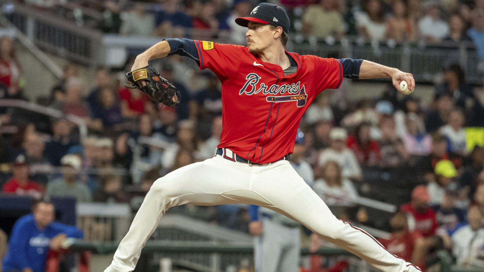 Atlanta Braves pitcher Max Fried in his wind up on the mound...